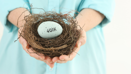 Woman holding nest with egg that stayed 401k