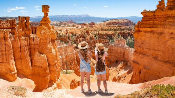 pair of women overlooking canyon